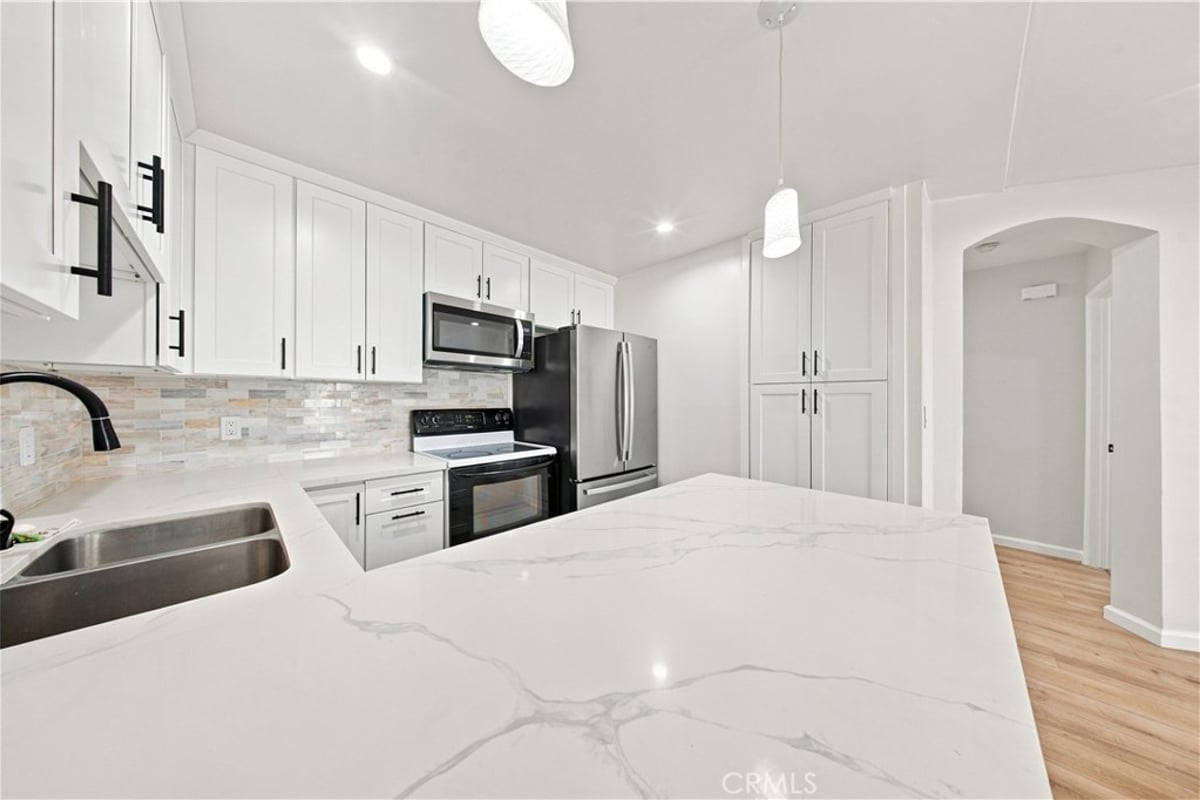 6815 Remmet Avenue 212, Los Angeles, CA 91303 — photo 1 of 32