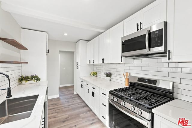 214 E 76th Place, Los Angeles, CA 90003 — photo 11 of 25