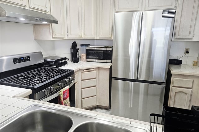 12864 Sycamore Village Dr., Norwalk, CA 90650 — photo 14 of 34