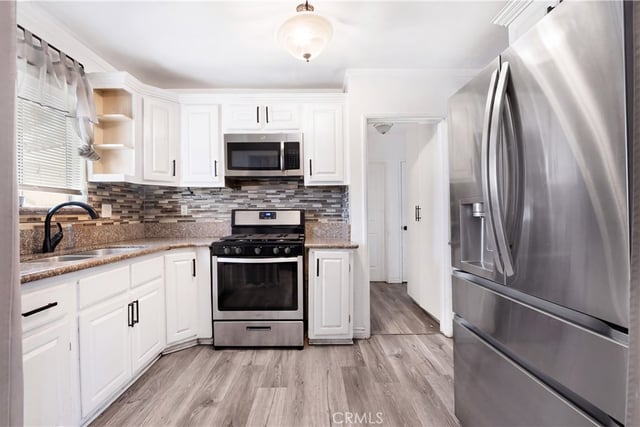 1438 S Woods, Los Angeles, CA 90022 — photo 4 of 43