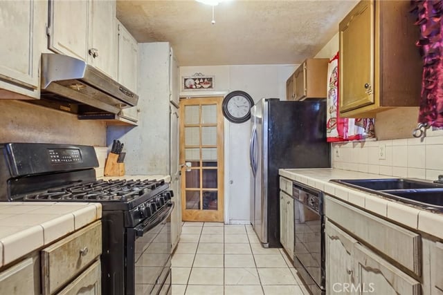 201 E 111th Place, Los Angeles, CA 90061 — photo 12 of 48